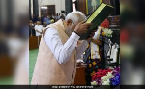 Read more about the article PM Bows To Constitution, Touches It To Forehead At NDA Meeting