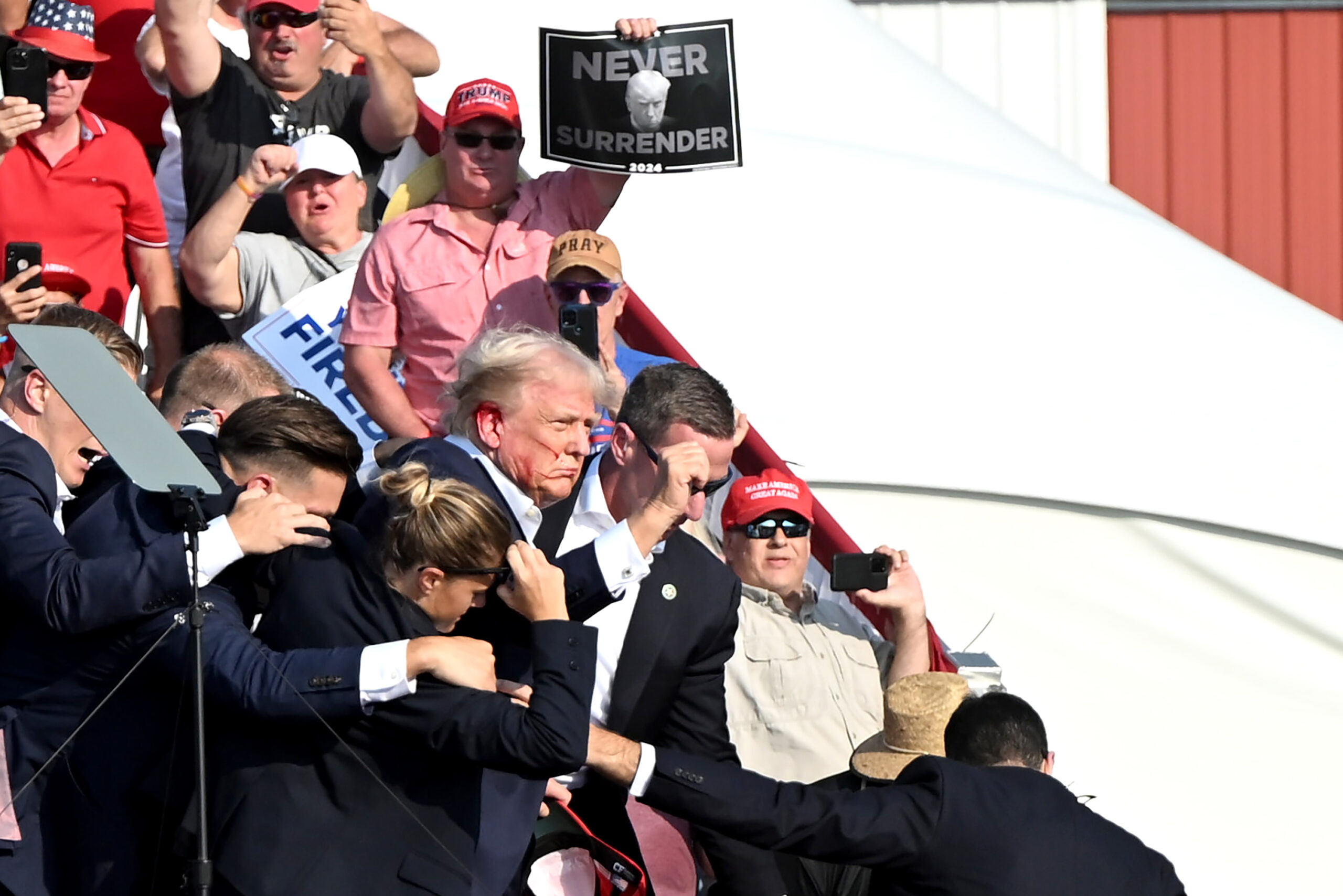 Donald Trump Bloodied, Defiant Image After Shooting Pumps Up His Voter Base