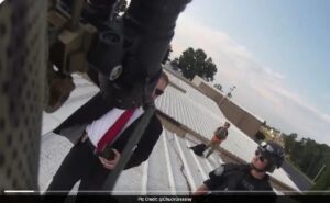 Read more about the article New Footage Shows US Officers Standing Over Body Of Donald Trump Shooter