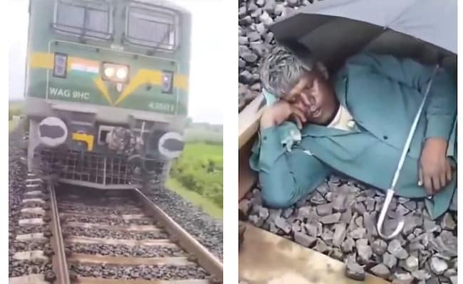 Read more about the article Train Halts For Man Sleeping Under Umbrella On Railway Track In UP