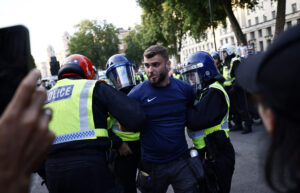 Read more about the article UK PM To Meet Cops Over Stabbing Attack As Protesters Chant “Save Our Kids”