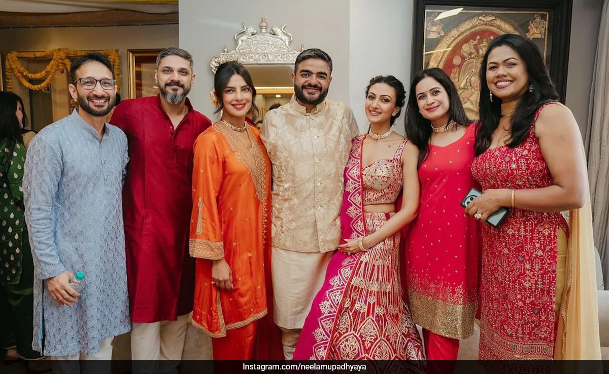 Read more about the article For Her Brother Siddharth Chopra’s Ring Ceremony, Priyanka Chopra Dazzled In An Orange And Gold Ethnic Suit With Bulgari Jewels