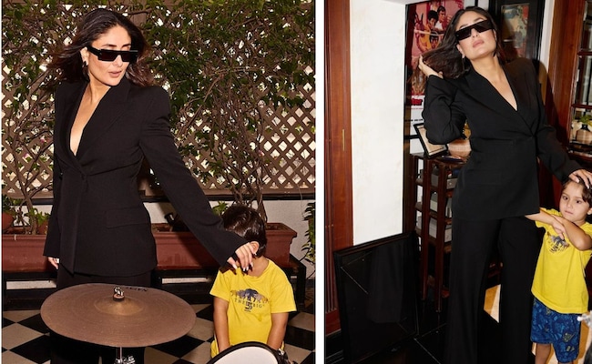 Read more about the article Kareena Kapoor Aces Corpcore Elegance With A Winning Working “Mama” Vibe In A Black Pantsuit And Younger Son Jeh Captured The Moment