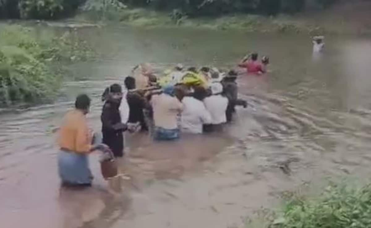 Andhra Family Wades Through Waist-Deep Water For Man's Funeral