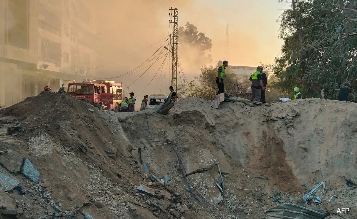 Read more about the article Lebanon Rescuer Picks Up “Pieces” Of Father After Israel Strike