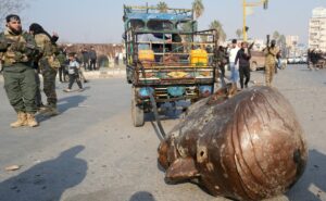 Read more about the article Statues Of Bashar Al-Assad’s Father Dragged Through Syria Roads