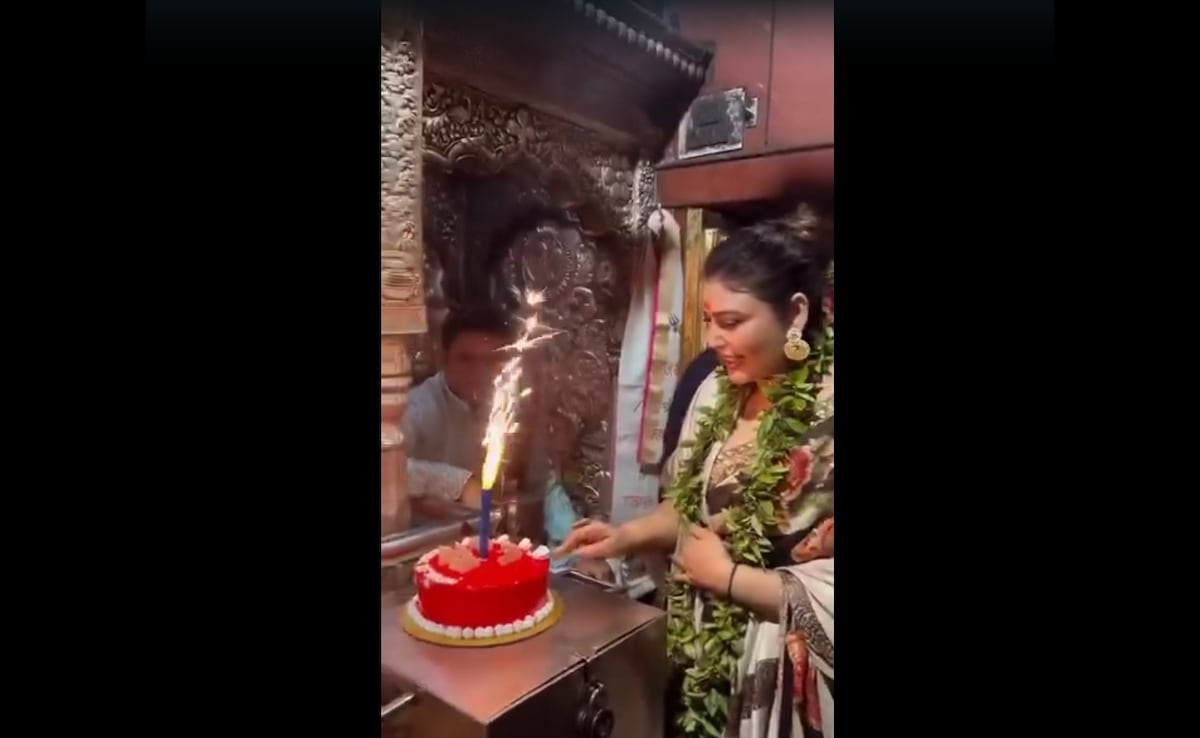 Read more about the article Woman Cuts Cake Inside Varanasi Temple, Sparks Outrage