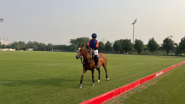 Naveen Jindal, patron of Jindal Polo warms up ahead of an exhibition match between India and Argentina at the Jindal Polo Estate in Noida on October 23, 2025. Anmol Singla/Firstpost