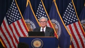 Read more about the article Fed holds rates steady as Powell flags resilient US economy, signals long wait for next cut – Firstpost