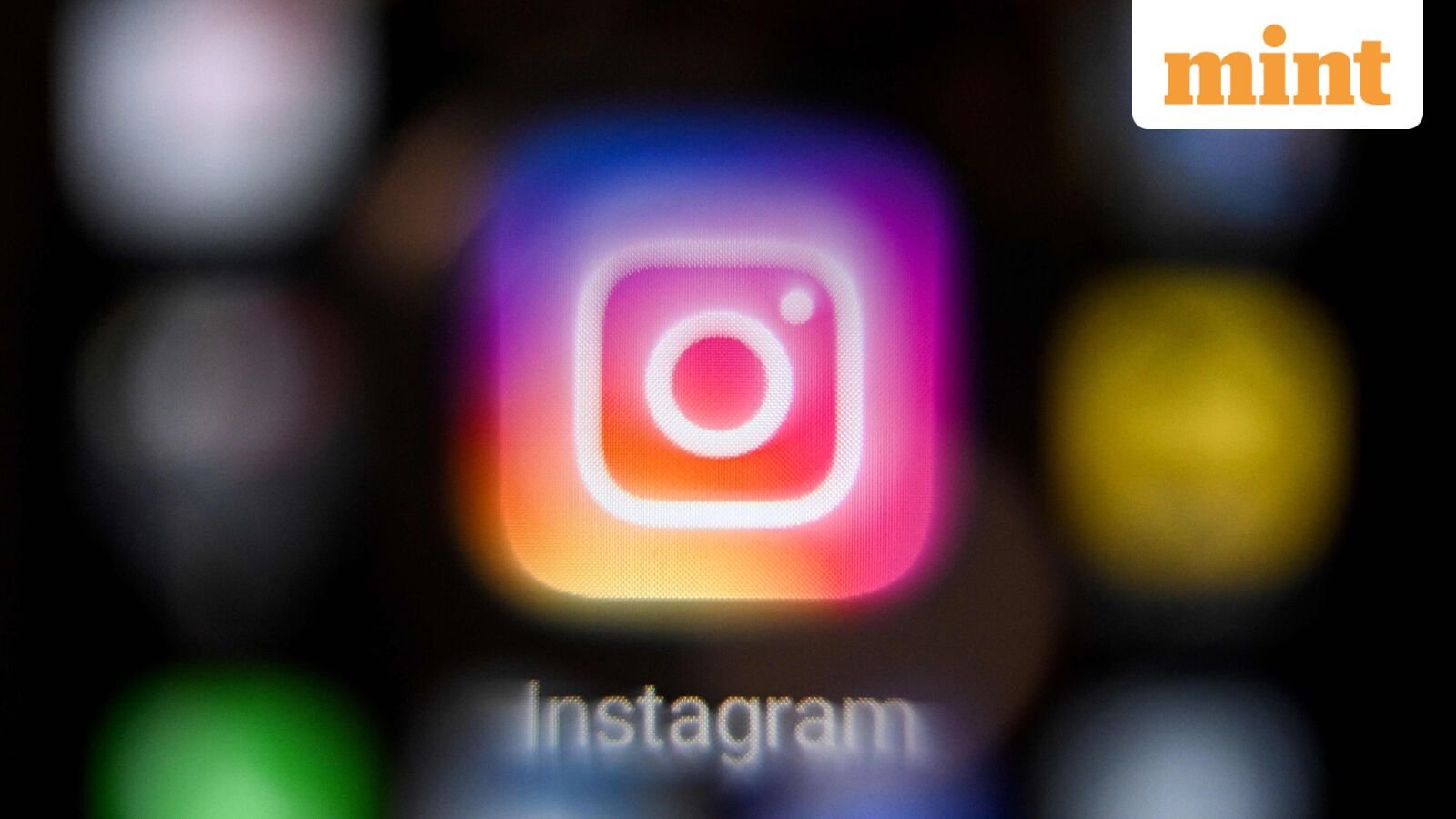 A photo taken on March 14, 2022, shows the US social network Instagram logo on a smartphone screen.