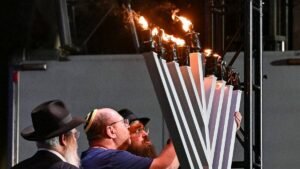 Read more about the article Israeli President Herzog visits Australia days after Bondi Beach attack shakes Jewish community – Firstpost